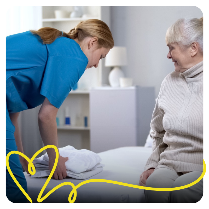 a nurse making a bed